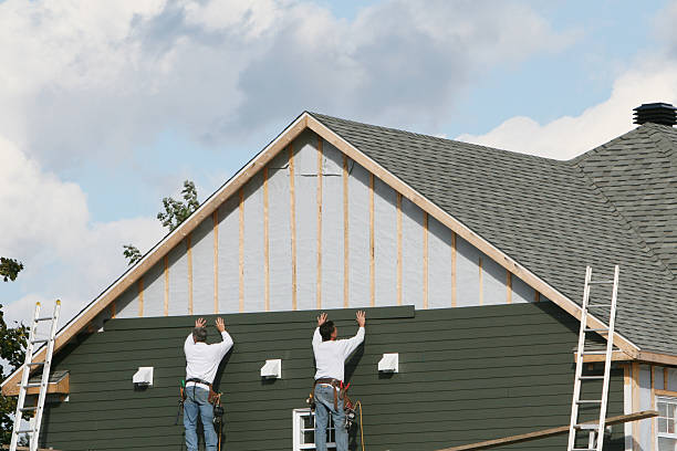 Professional Siding technician working in Clayton, IN